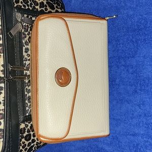 Vintage Dooney and Bourke cream crossbody bag